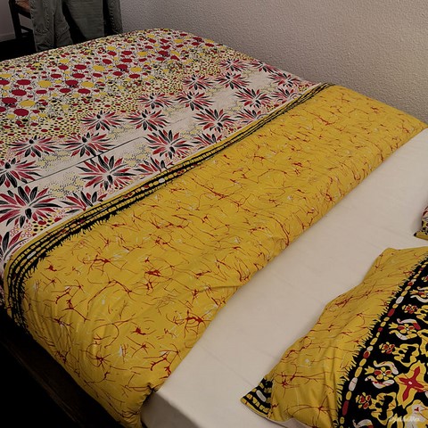 ​Reversible duvet + pillowcases in wax fabric,