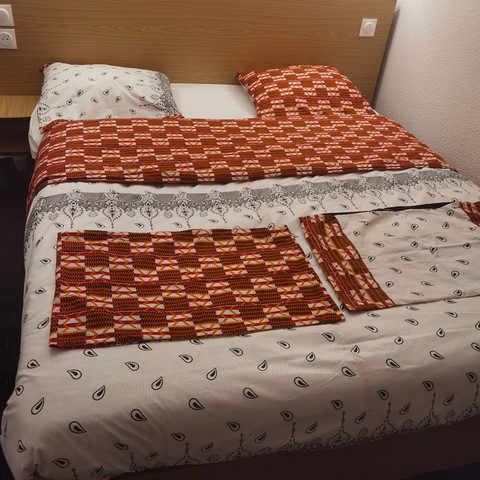 Reversible duvet + pillowcases in wax fabric,