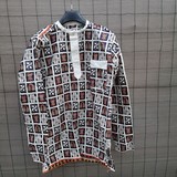 Tunique homme en tissu Ndop du Cameroun